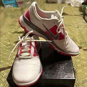 Nike White and Pink Athletic Shoes for Performance